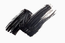 Black brush strokes on a white background