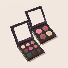 Two makeup palettes with colorful shades on a beige background